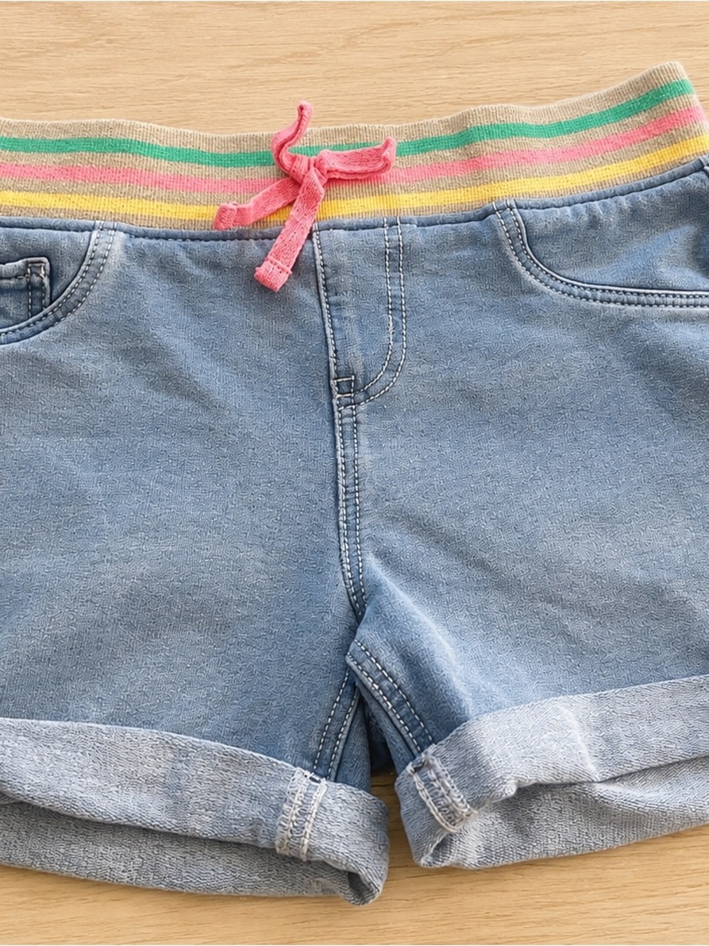 Light Blue Denim-Style Shorts with Rainbow Waistband